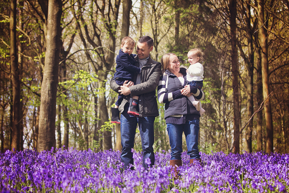 Family Portrait in the bluebell woods bluebell photography Kent